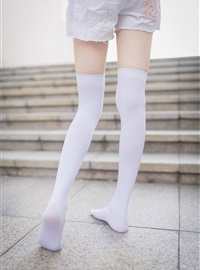 Rabbit plays with painted white stockings over the knee(37)